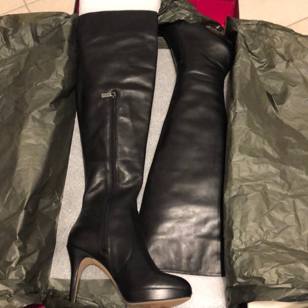 Vince Camuto knee high, black leather boots.